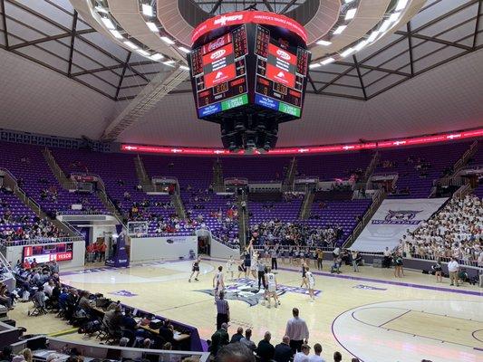 A 2019 high school semi-final basketball game tips off at the Dee Events Center.