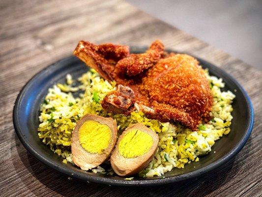 Vegetable fried rice with fried pork chop