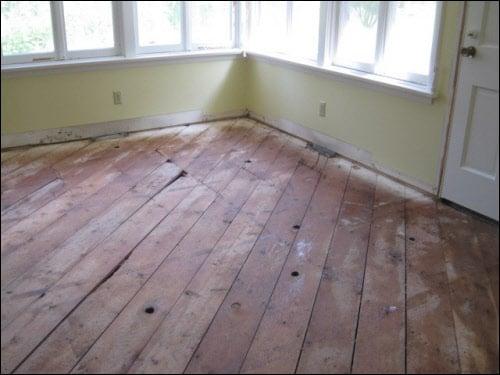 After removing the infected tiling we layered the floor in our asbestos removal & prevent coating.