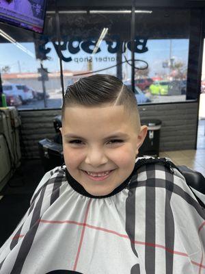 Mid fade combover with a part line