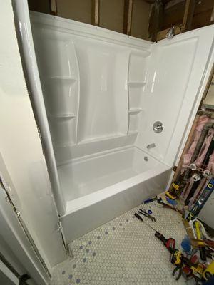 New tub and shower enclosure installed