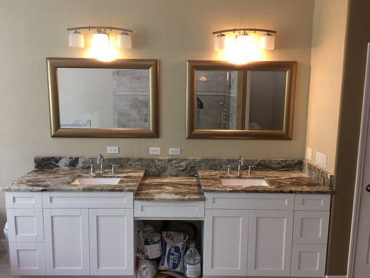 Custom cabinet installment with Granite countertop, Lights and mirrors