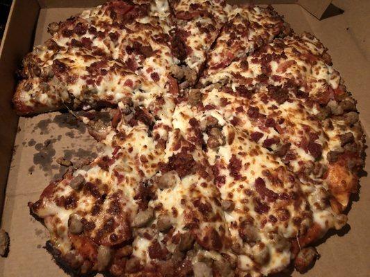 Meat lovers pizza from God Father's taste as good as it looks