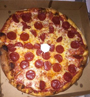 Large pepperoni pizza.