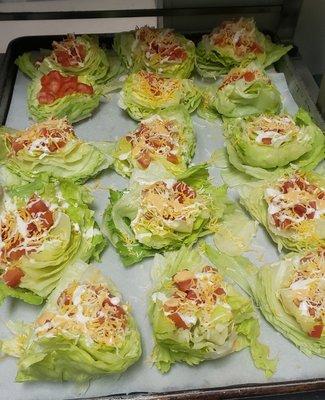 Cheesy green salad Family size $50