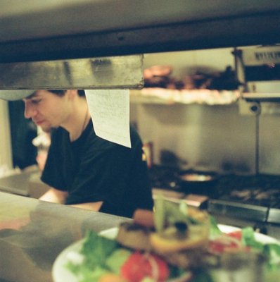 Chef Shawn cooking at Post Time Pub. Picture taken prior to Covid.