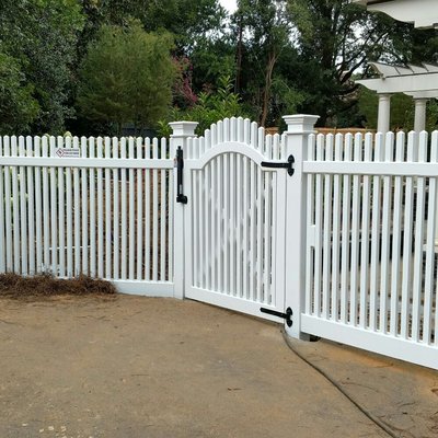 Custom wood fence installed in Myers Park Charlotte. Both gates are self closing and self latching to meet BOCA pool codes.