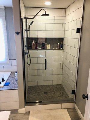 old shower surround removed and beautiful new tile shower installed