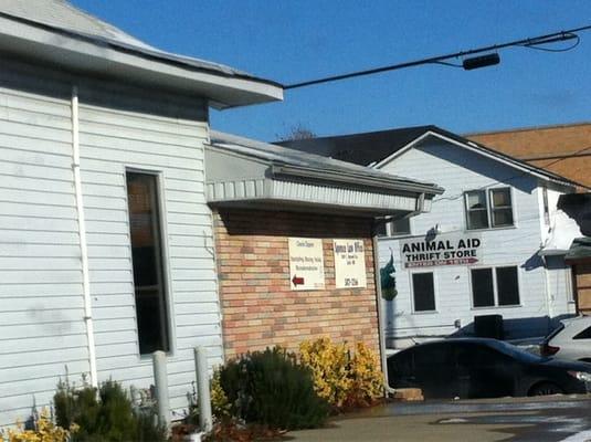 The brick building, the Animal Aid is across the street