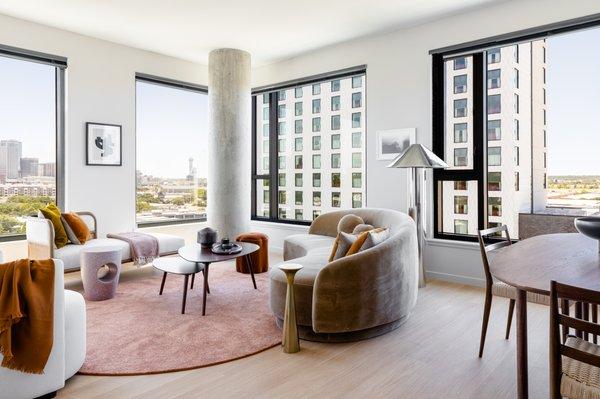 Dallas Urby's thoughtfully designed apartments feature open layouts, balconies, and ceiling heigh windows.