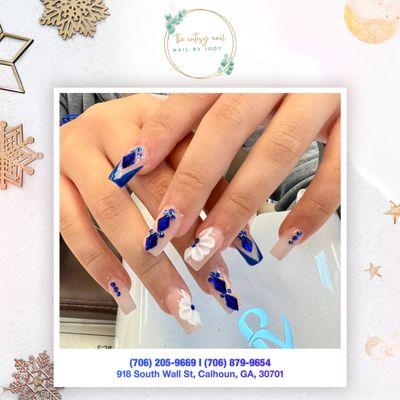 Embrace winter's chill with nails that thrill! From festive reds to icy blues, our salon's winter collection has your nails covered in style