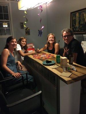 Game night in the garage-turned-lounge. Two cool bars with plenty of seating.