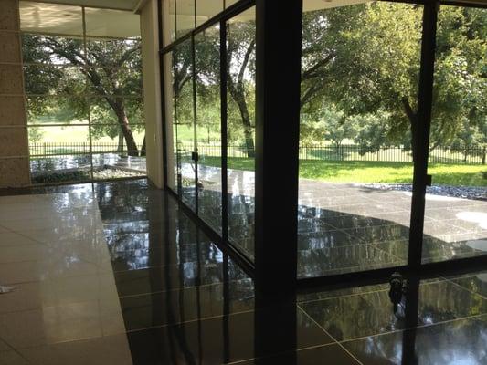 Terrazzo floor that had yellowed, been waxed and dulled.  We restored a mirror-like shine naturally.