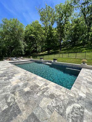 Gunite pool with wall and tanning ledge