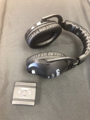 I carry Garrett MS-3 Head Phones. These are cordless with a sending unit. These can be used with most machines, even older machines.