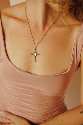 10K gold cross necklace with tourmaline baguette