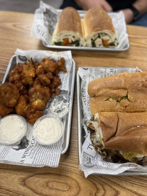 Buffalo cauliflower (vegan cauliflower wings), Cubano and Grilled Chicken and Rabe.