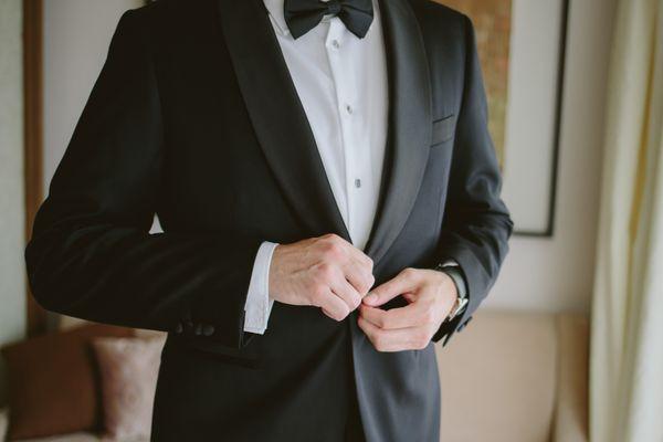 Shawl lapel black tuxedo with shirt, tie and studs from Tysons Indochino