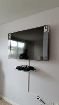 TV and shelf mounting