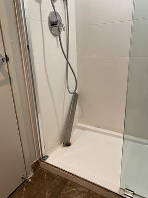 Shower pressure ok but metal piece needs fixing