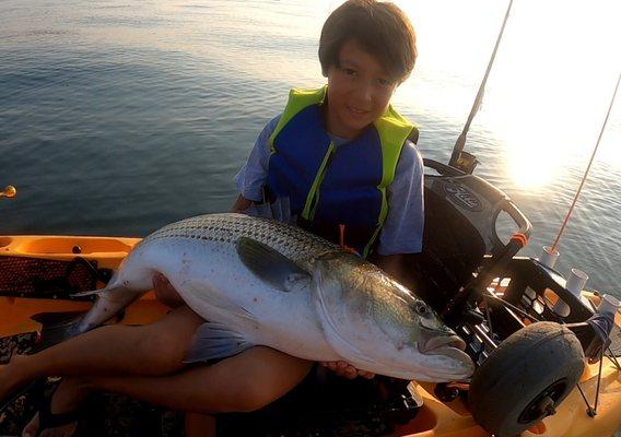 A fish of a lifetime for this young man caught while kayak fishing with CT Fish Nerd!