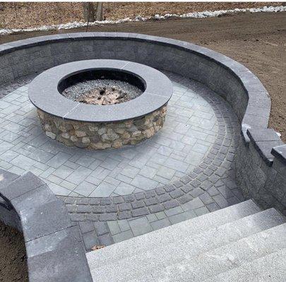 New fire pit and seating wall,with blue stone blend pavers