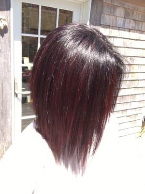 Dark brown hair with red violet highlights