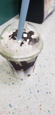 Small stuffed cool mint milkshake - hot fudge and some sort of white sauce on the sides - yum!