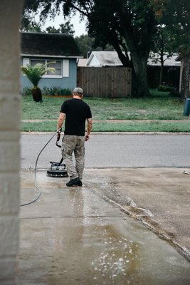 Surface cleaning a driveway