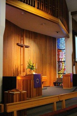 Traditional worship with choir and organ in a beautiful sanctuary.