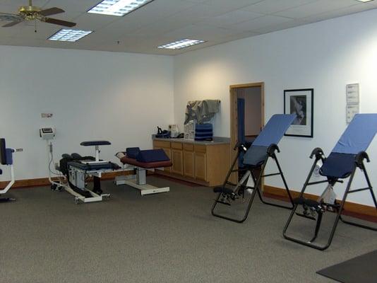 The office includes a spinal traction table designed exclusively for treating herniated and bulging spinal discs.