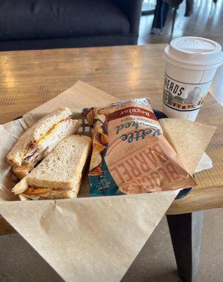 Turkey sandwich and latte