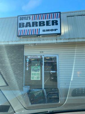 Store front of Doyle's barber shop