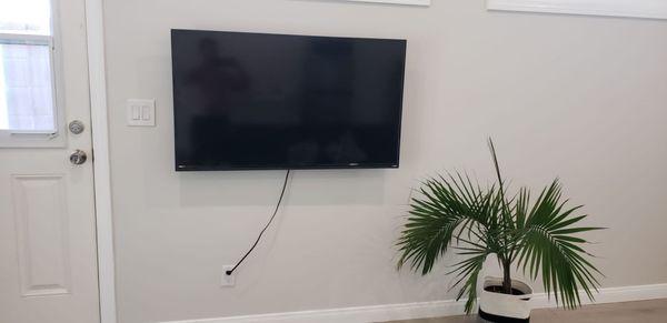 TV mounted to wall