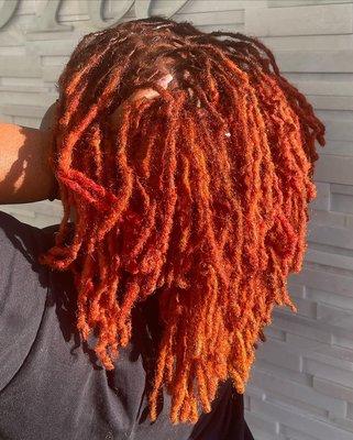 Retwist and color on locs.