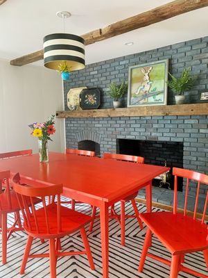 Custom Lime Washed brick fireplace  wall updates and refreshes breakfast room.