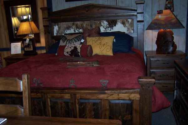 Silverado king bed, with cowhide panels, one of our favorite groups to offer