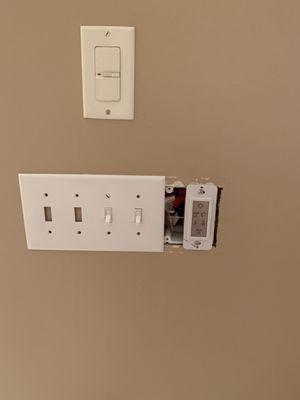 The light switch they mounted upside down and left exposed.