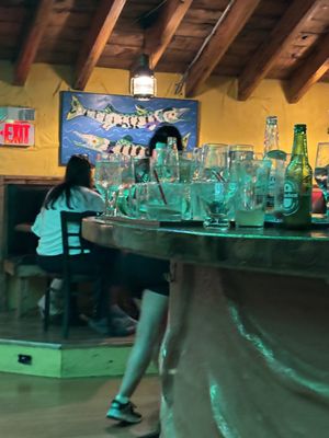 Easily had to be close to 30 glasses on this bar...when the restaurant had a total of 3 tables.