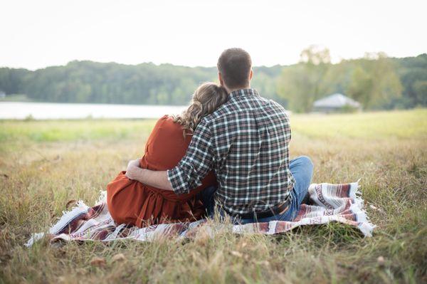 Couple sitting on a blanket