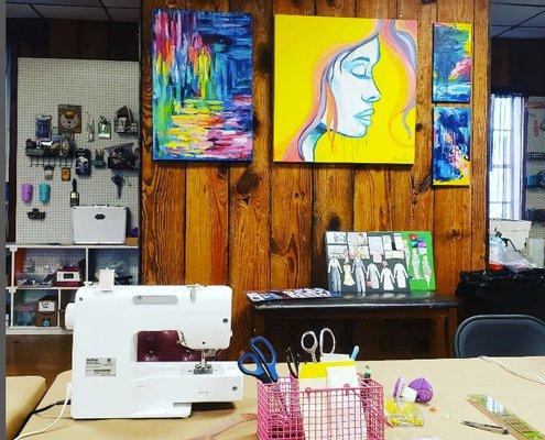 Sewing machines and supplies are provided. Along with the art pieces from the art studio students