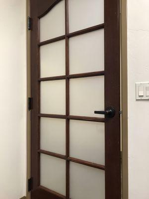 Door has milk glass color panels so you know when doctor or assistant is coming in.