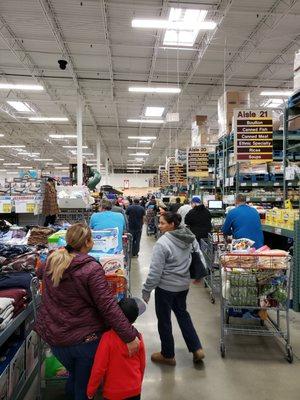 The Great TP Shortage of 2020, check out line backed up to the freezer isle, the employee's handled the insanity well.