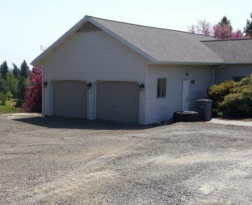 Attached pole building garage