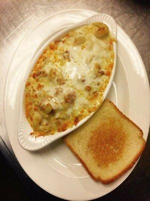 Our (not so traditional) Baked Steak House Lasagna. We use Cavatappi noodles with our homemade meat sauce and topped with mozzarella cheese.