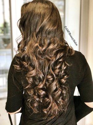 Color,haircut and styling with big soft waves