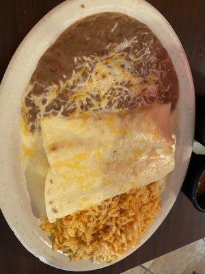 Burrito Dinner, hot and very tasty! Beans are home made and have a great flavor and texture, some whole beans at times.