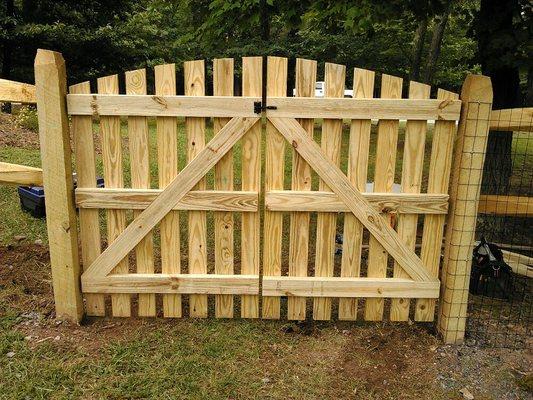 Custom gates for split rail fenced yard