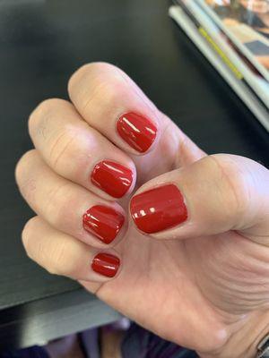 Red manicure.