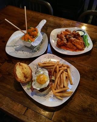 Top left: Dynamite Shrimp. 
 Top right: A dozen wings, "House" sauce. 
 Bottom center: "Hangover" burger with regular French fries.